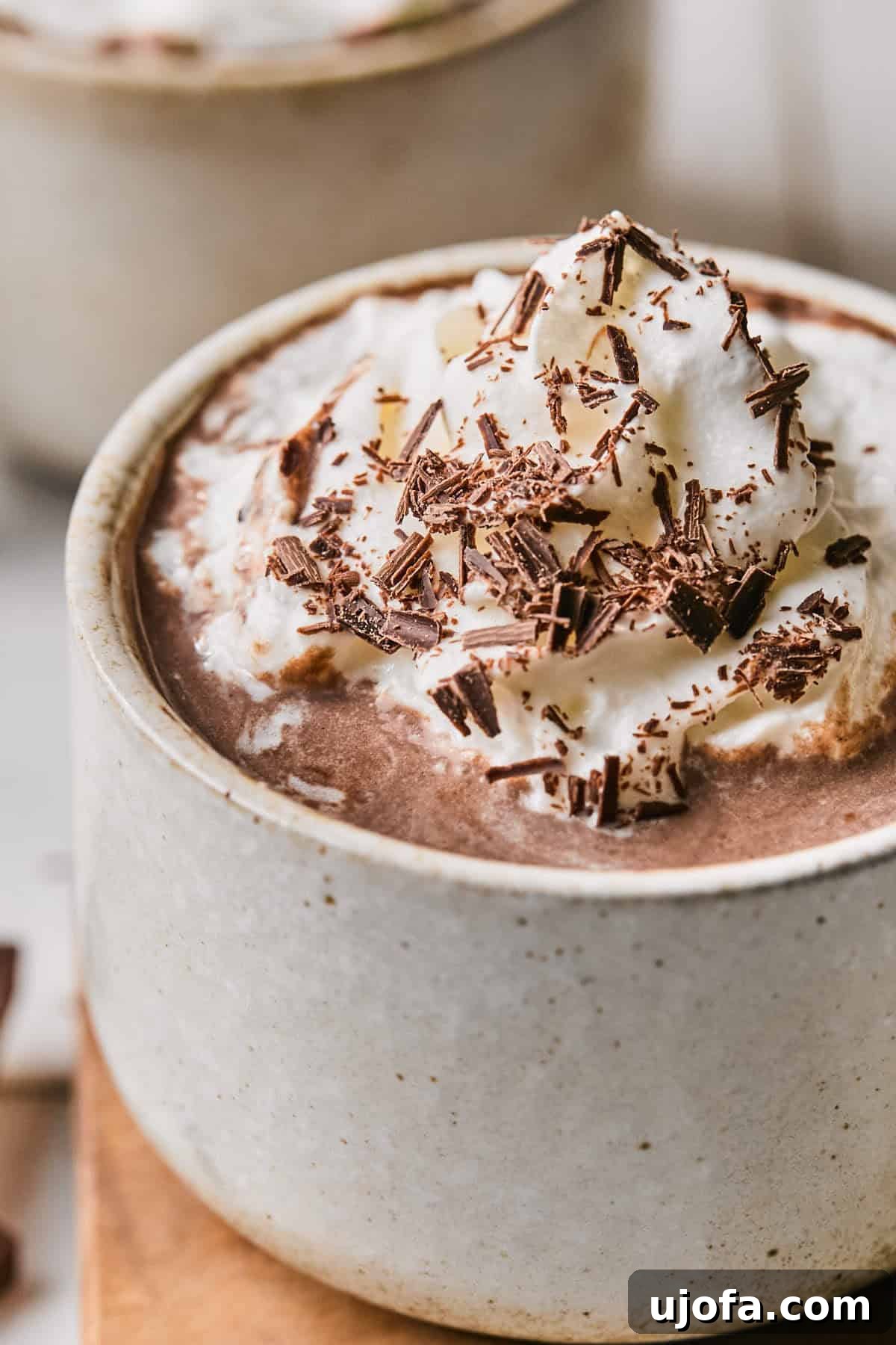 Cozy Protein-Packed Cocoa 7 An inviting close-up shot of the protein hot chocolate in a mug, emphasizing its rich texture and warmth, ready to be enjoyed.