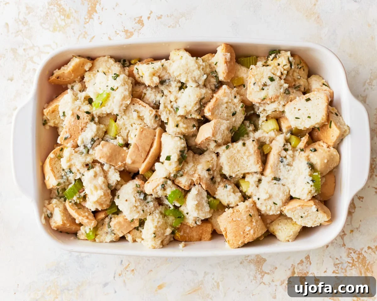 Flavorful Gluten-Free Stuffing 13 Gluten-free stuffing in a baking dish ready to be baked.
