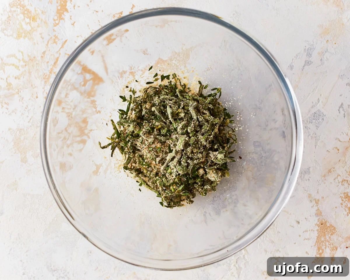 Flavorful Gluten-Free Stuffing 9 Seasoning mix for gluten-free stuffing in a glass mixing bowl