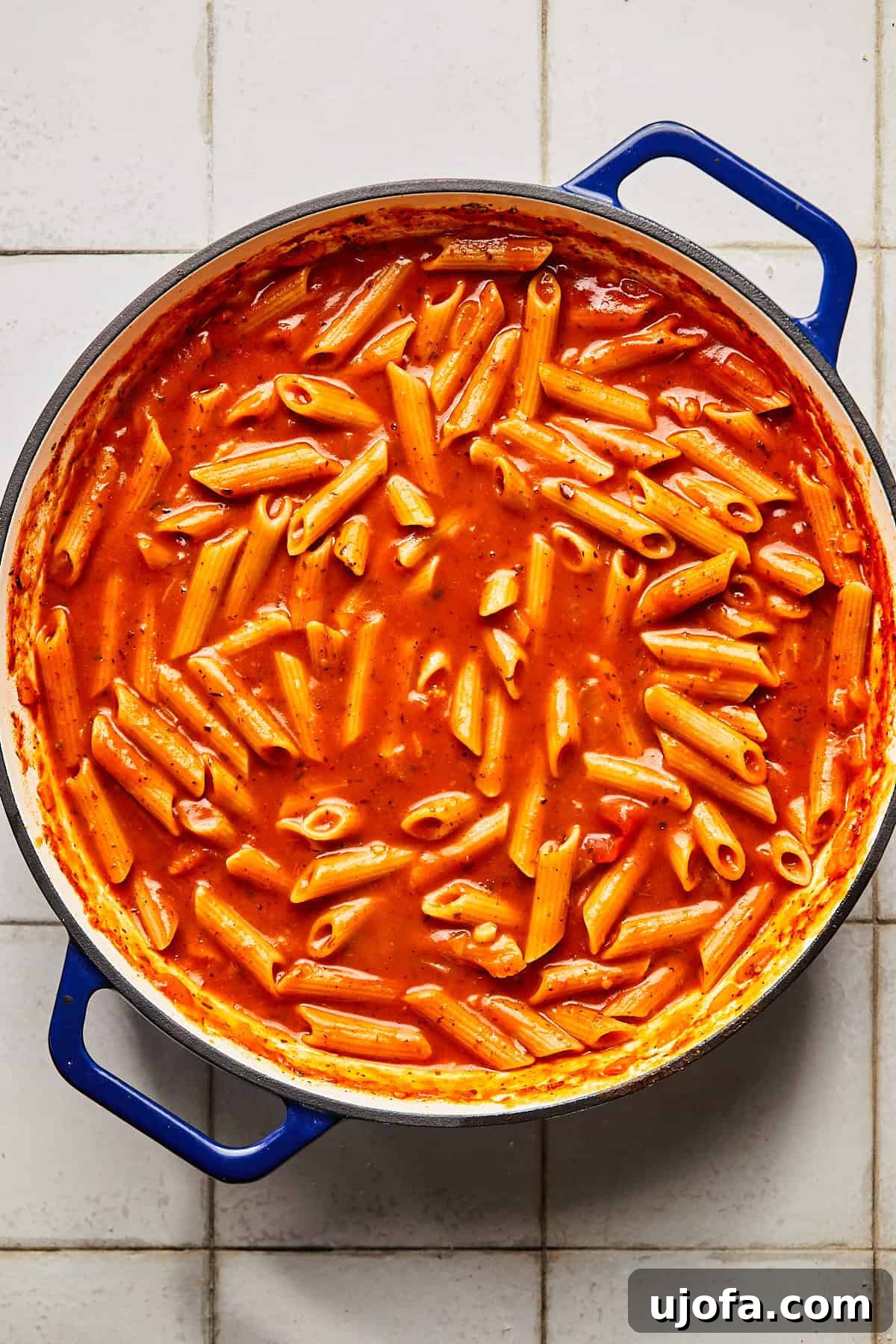 pasta and red sauce in a pot