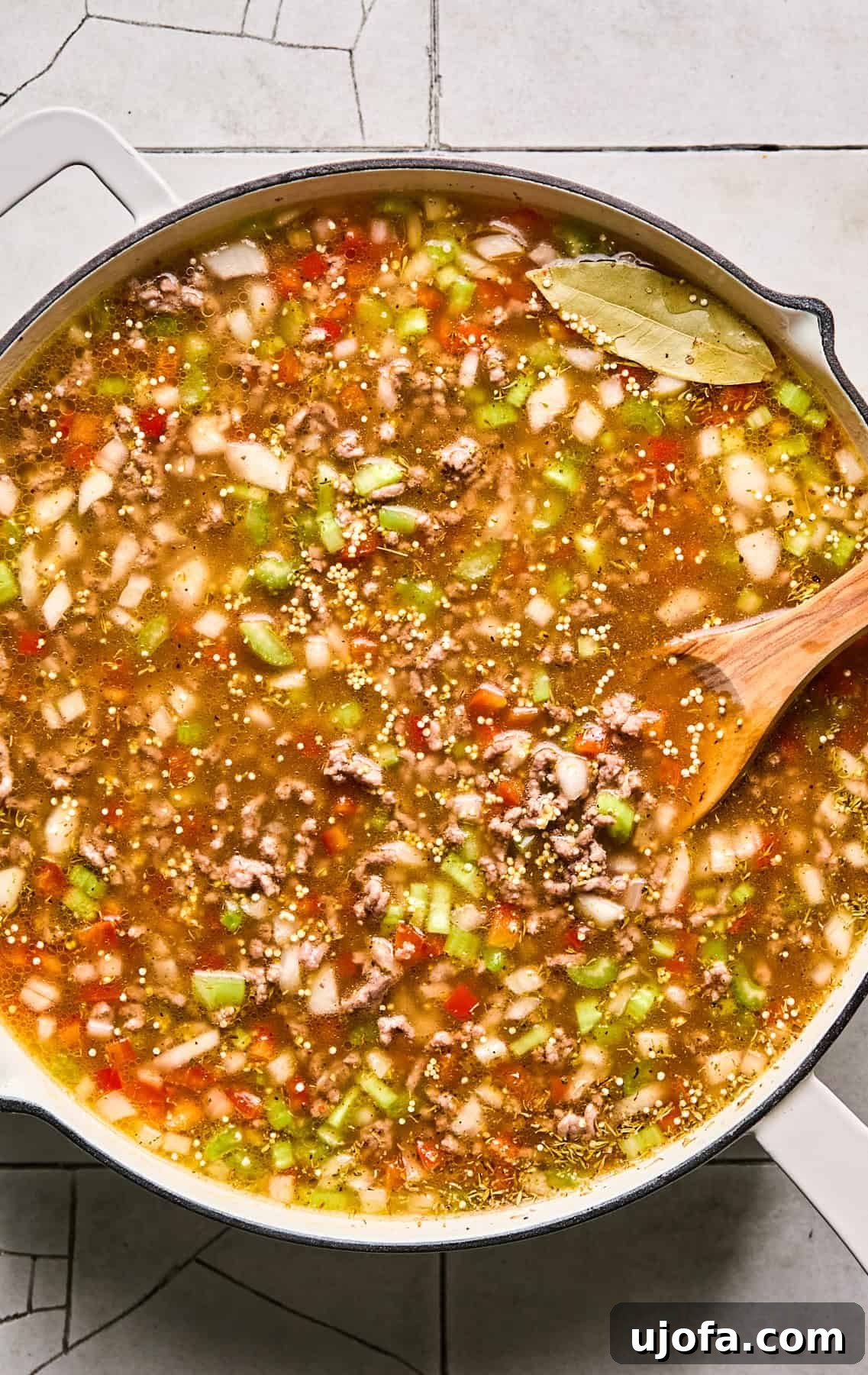 Dirty Quinoa: A Flavorful and Healthy Take on a Classic 7 The dirty quinoa ingredients simmering gently in a covered skillet, absorbing the rich broth.