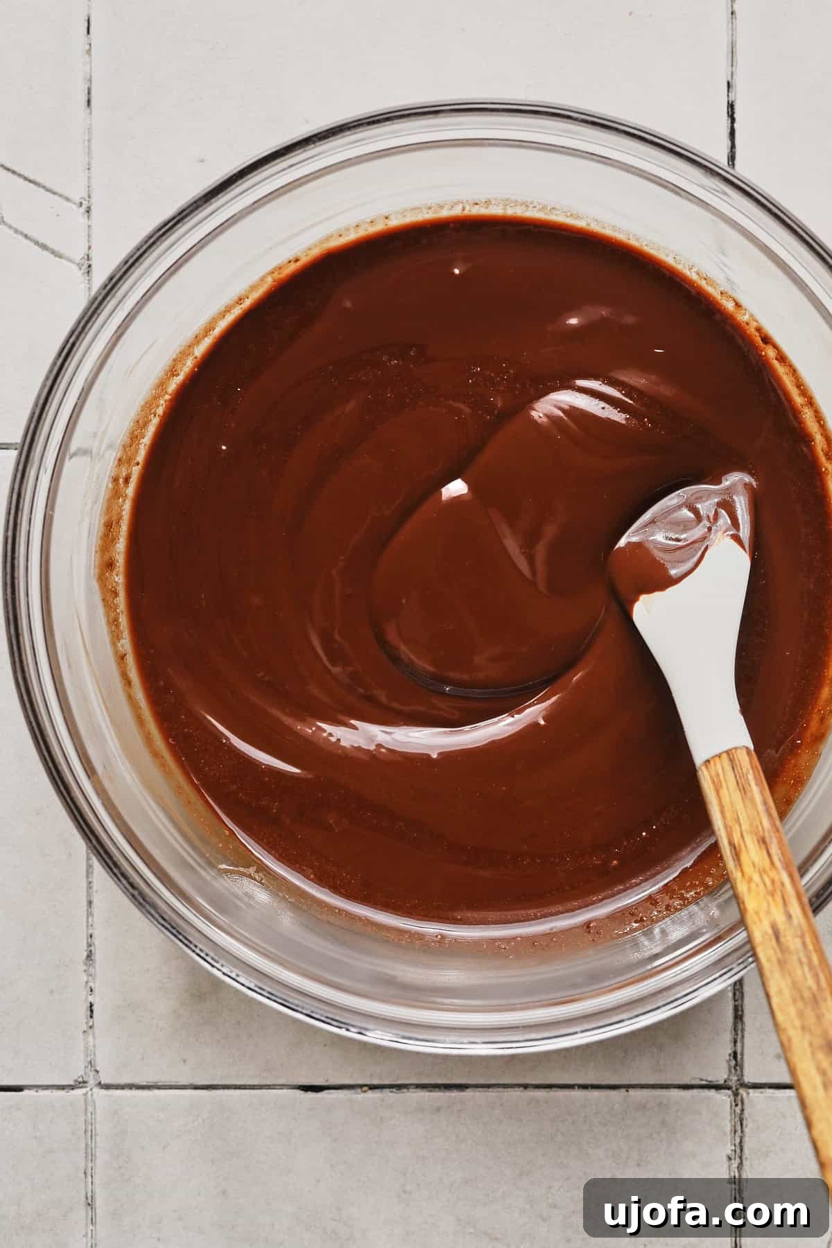 Melted chocolate and butter mixture in a bowl.