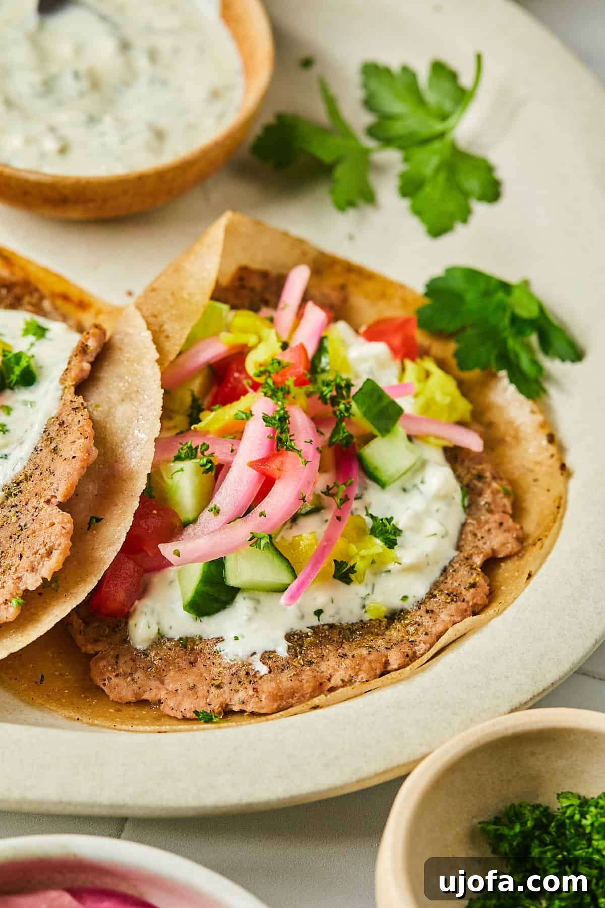 Turkey Gyro Smash Tacos 12 A single turkey smash burger taco with generous toppings, ready to eat