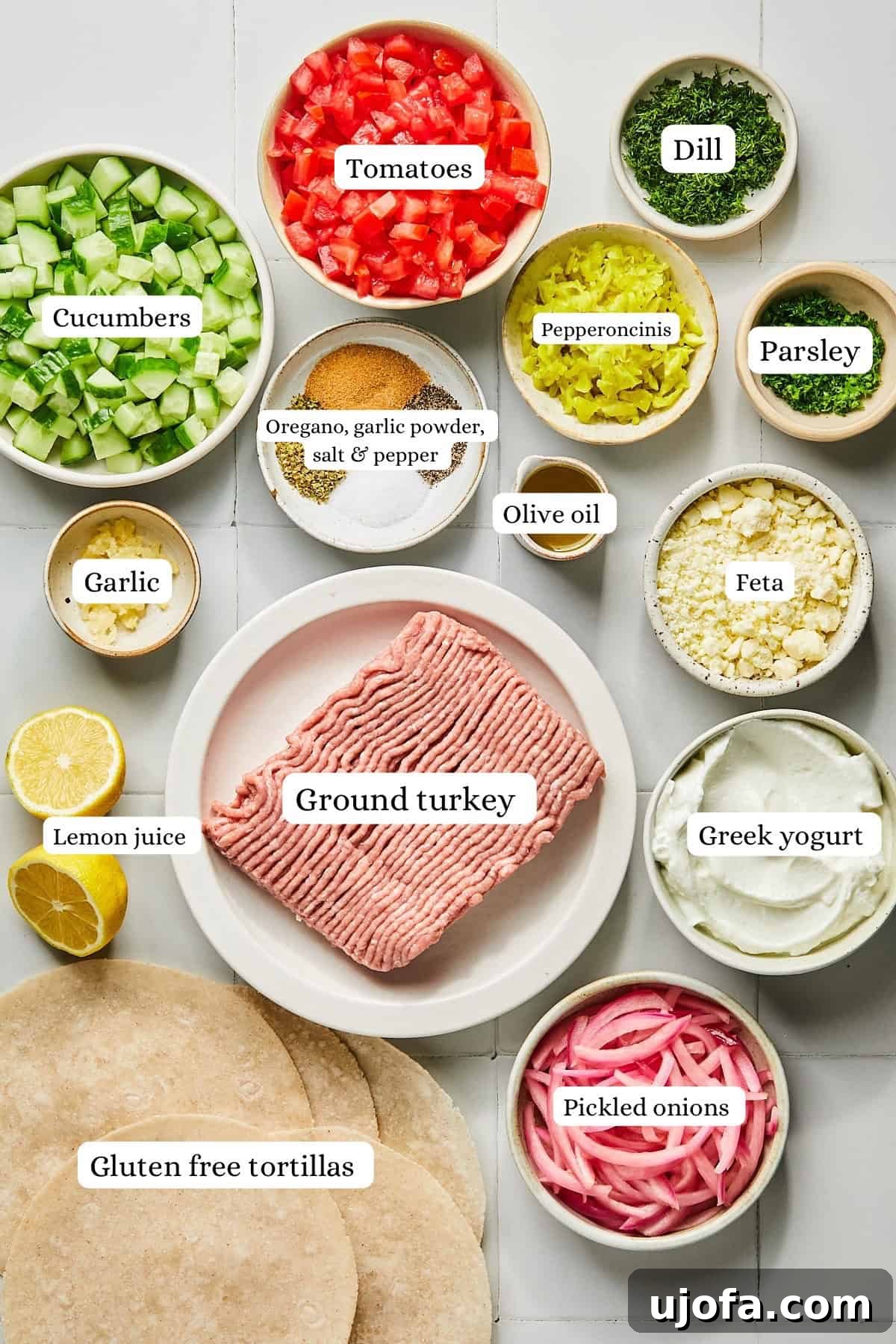 Turkey Gyro Smash Tacos 3 Various fresh ingredients for turkey smash burger tacos in colorful nesting bowls