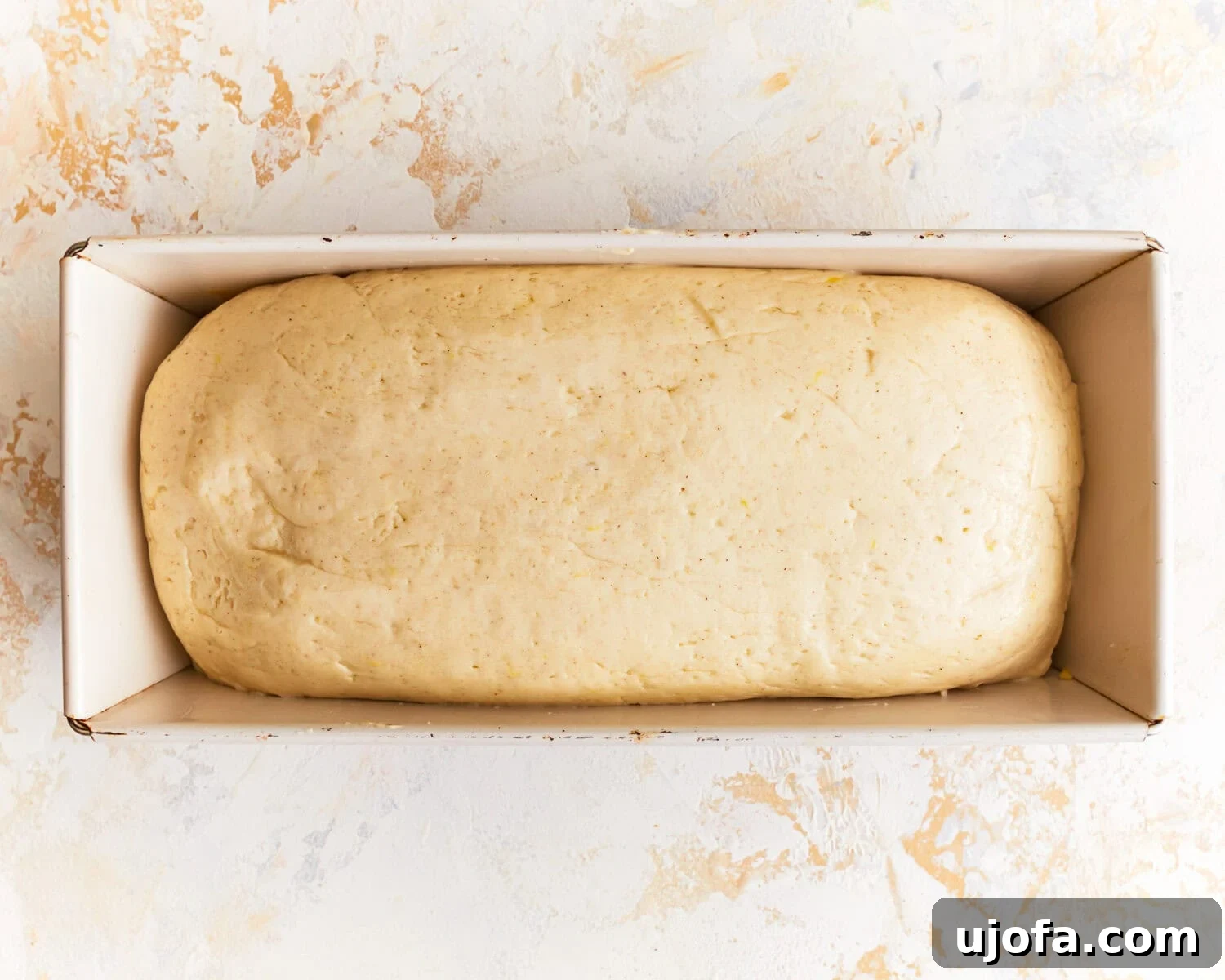 Hearty Gluten-Free Potato Loaf 10 Dough for gluten free potato bread in a loaf pan.