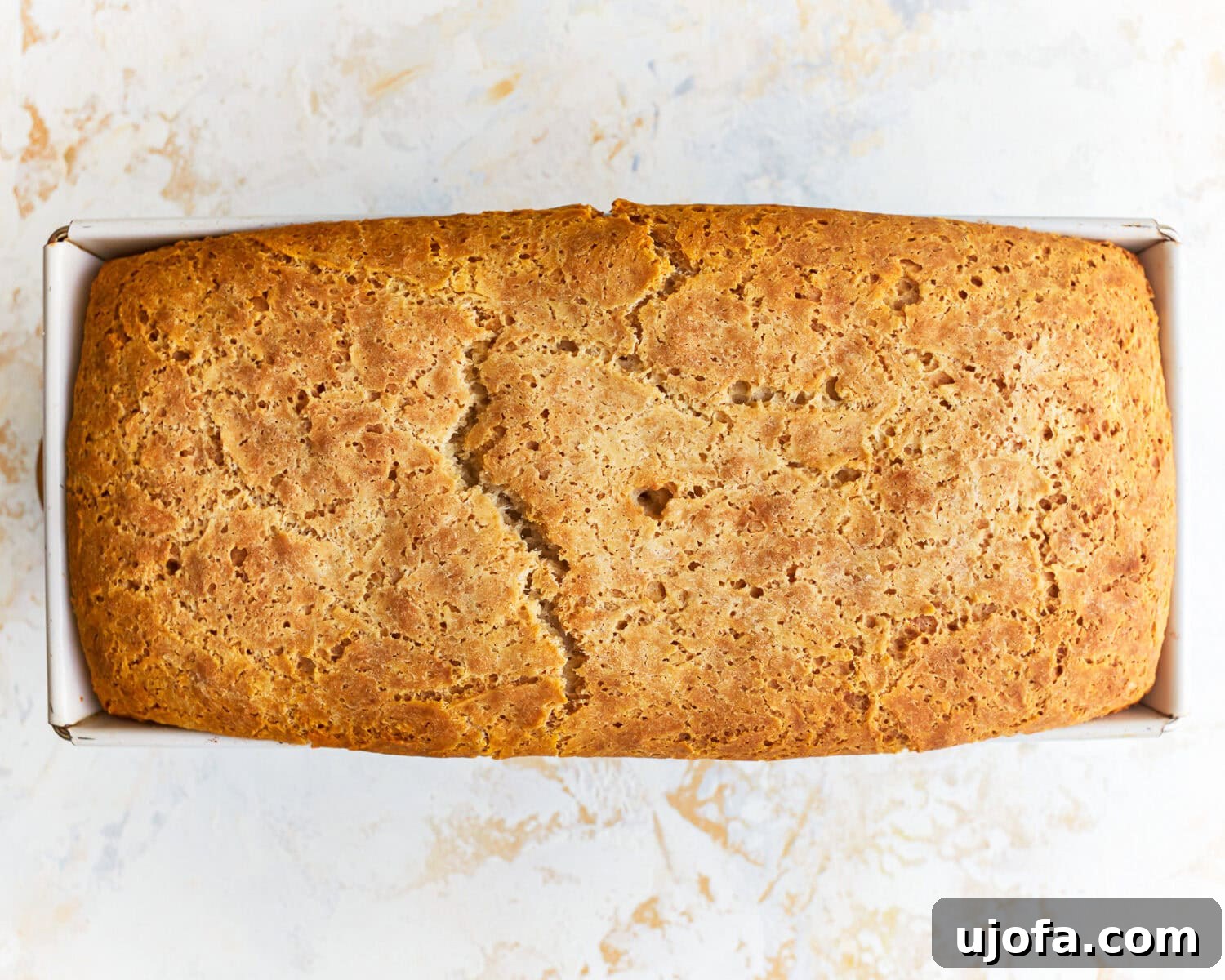 Hearty Gluten-Free Potato Loaf 12 Freshly baked gluten free potato bread in a loaf pan.