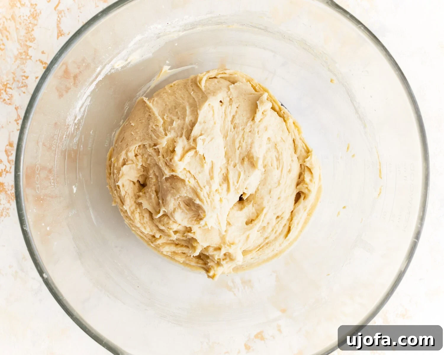Hearty Gluten-Free Potato Loaf 7 Sticky dough for gluten free potato bread in a glass mixing bowl.