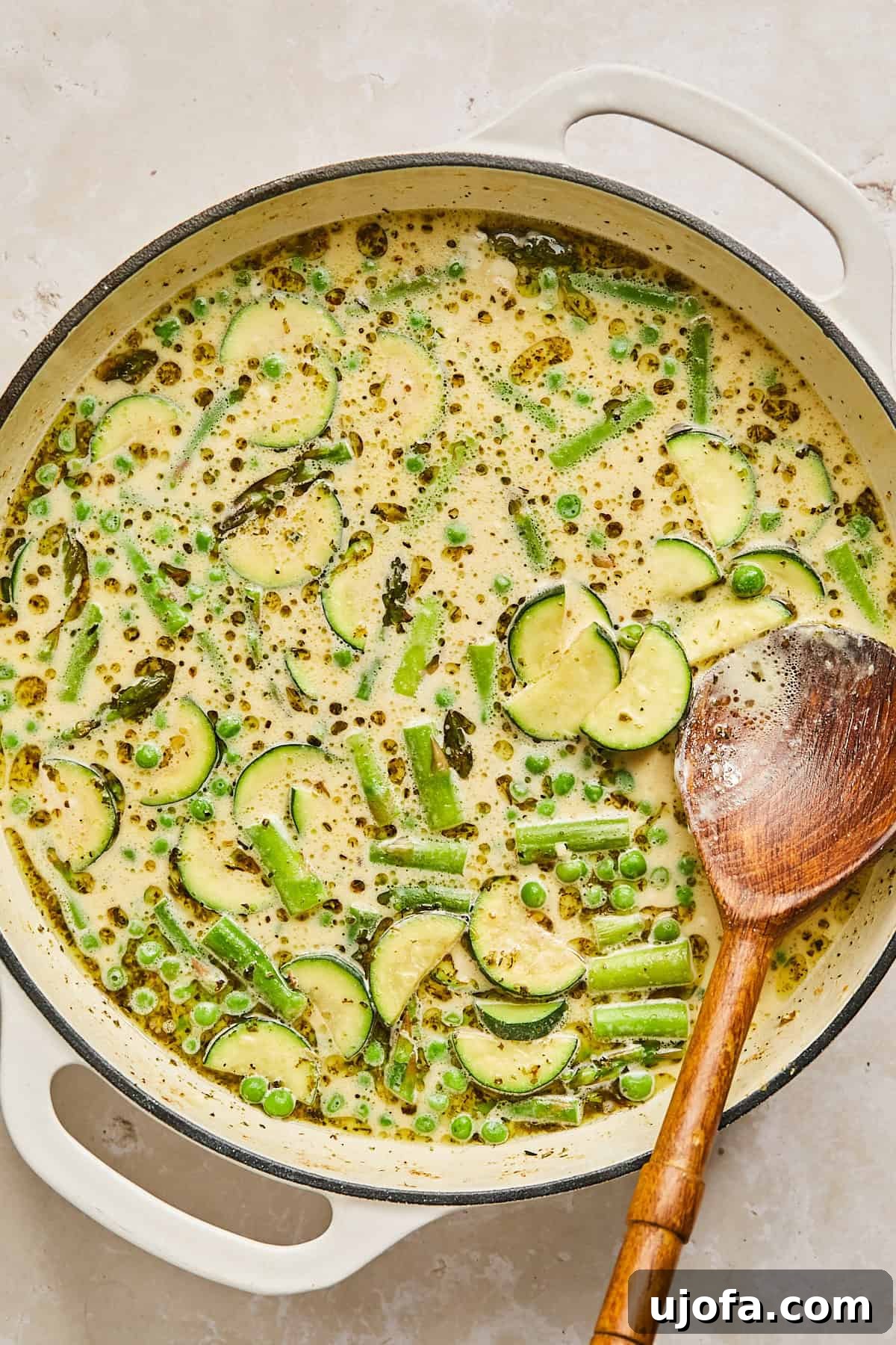 veggies in a pan with creamy sauce
