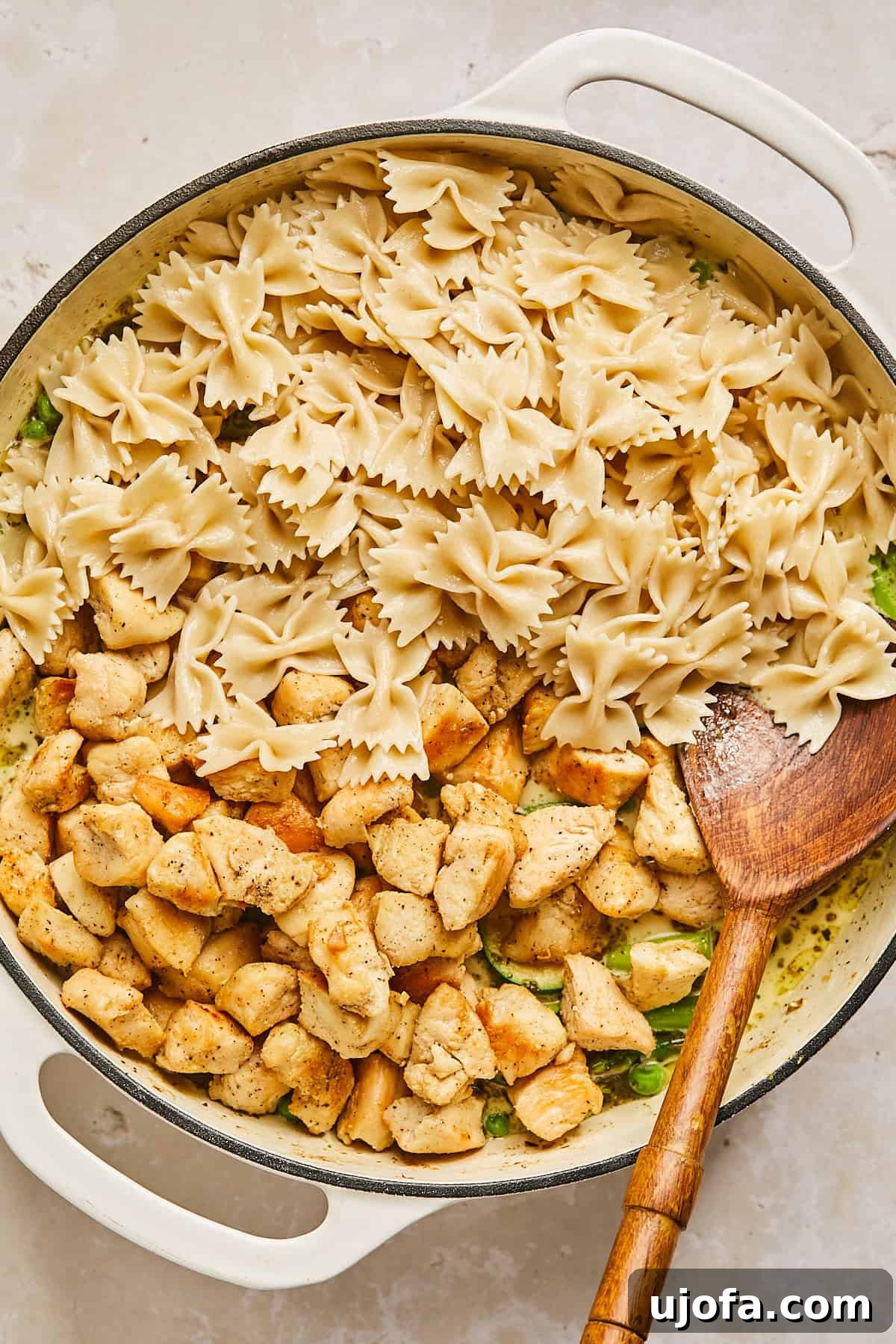 chicken and pasta in a pan
