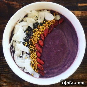 Close-up of a perfectly blended banana-free acai smoothie bowl ready for toppings.