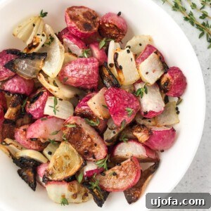A finished plate of Thyme Roasted Radishes and Onions.