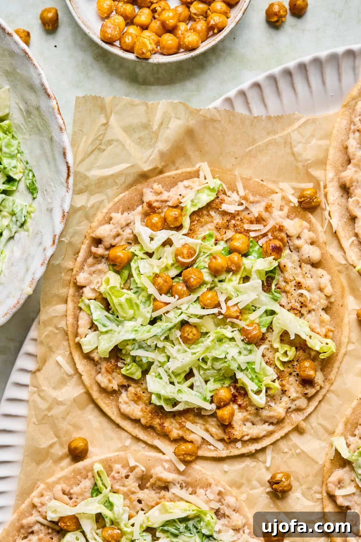 step 8: taco assembly with romaine, parmesan, and chickpeas