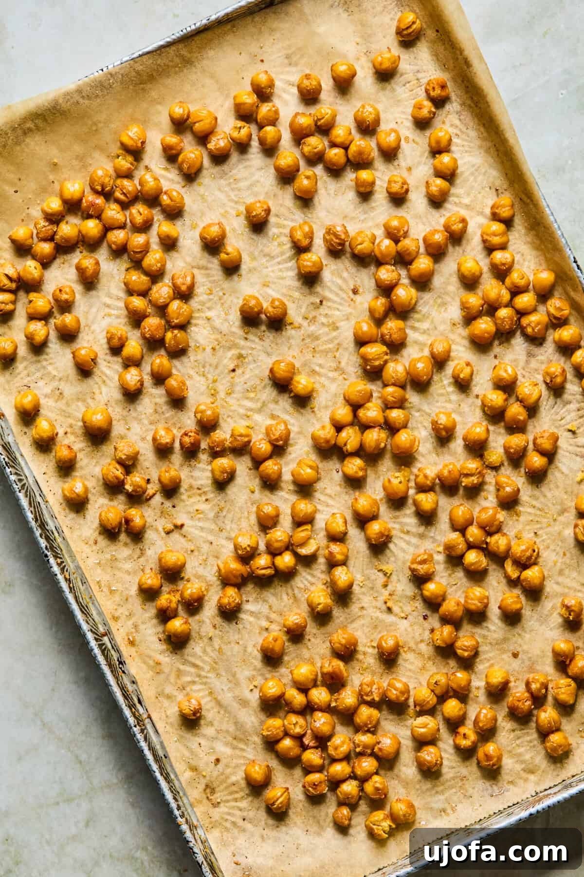 step 2: roasted chickpeas tossed with oil and seasoning on pan