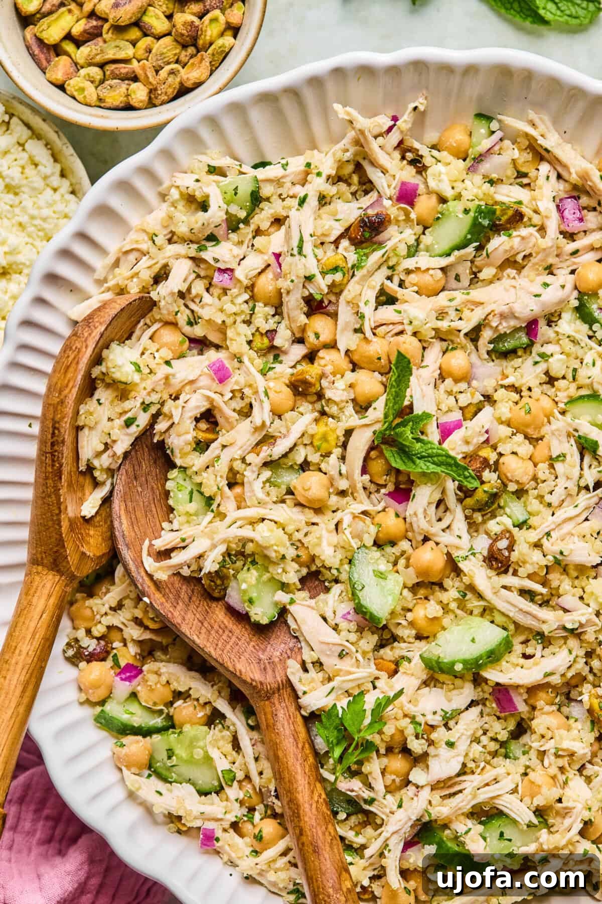 Jennifer Aniston Protein Power Prep Salad 2 A beautifully plated high protein Jennifer Aniston salad featuring grilled chicken, fluffy quinoa, crisp cucumber, fresh herbs, and a light lemon dressing.