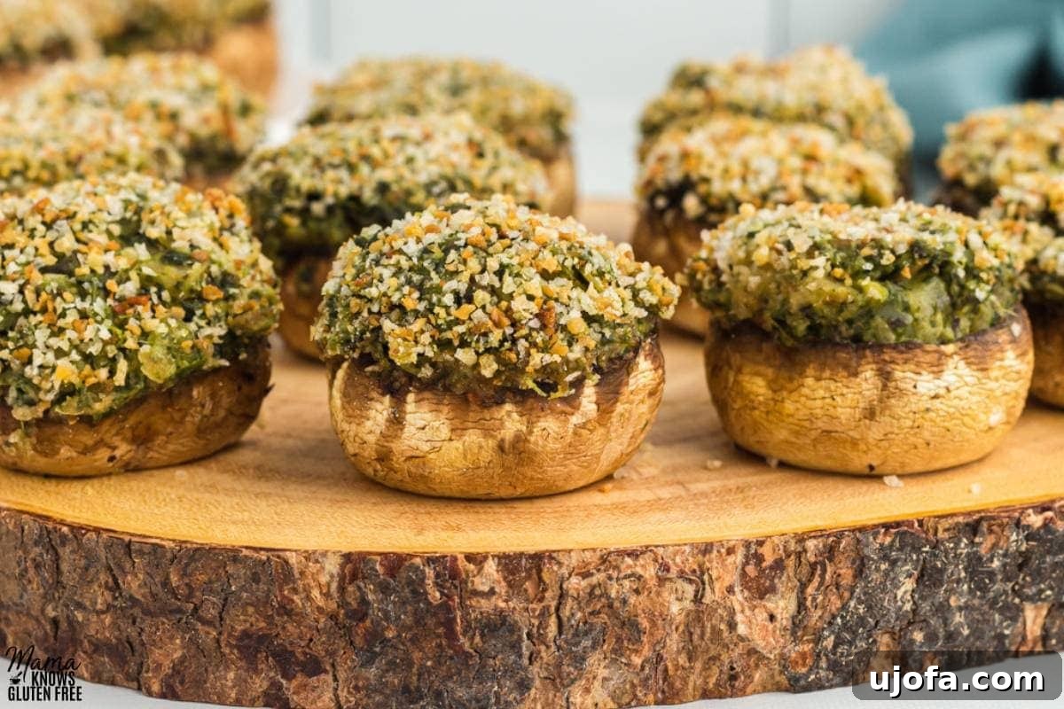 gluten-free stuffed mushroom son a wood cutting board