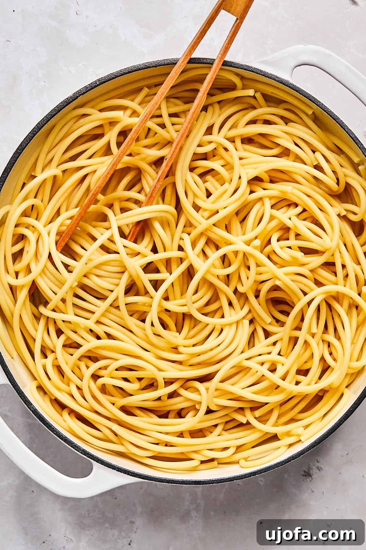 Simple 5 Ingredient Gluten Free Bucatini Cacio e Pepe 4 Bucatini pasta after boiling in a pot of salted water on the stove