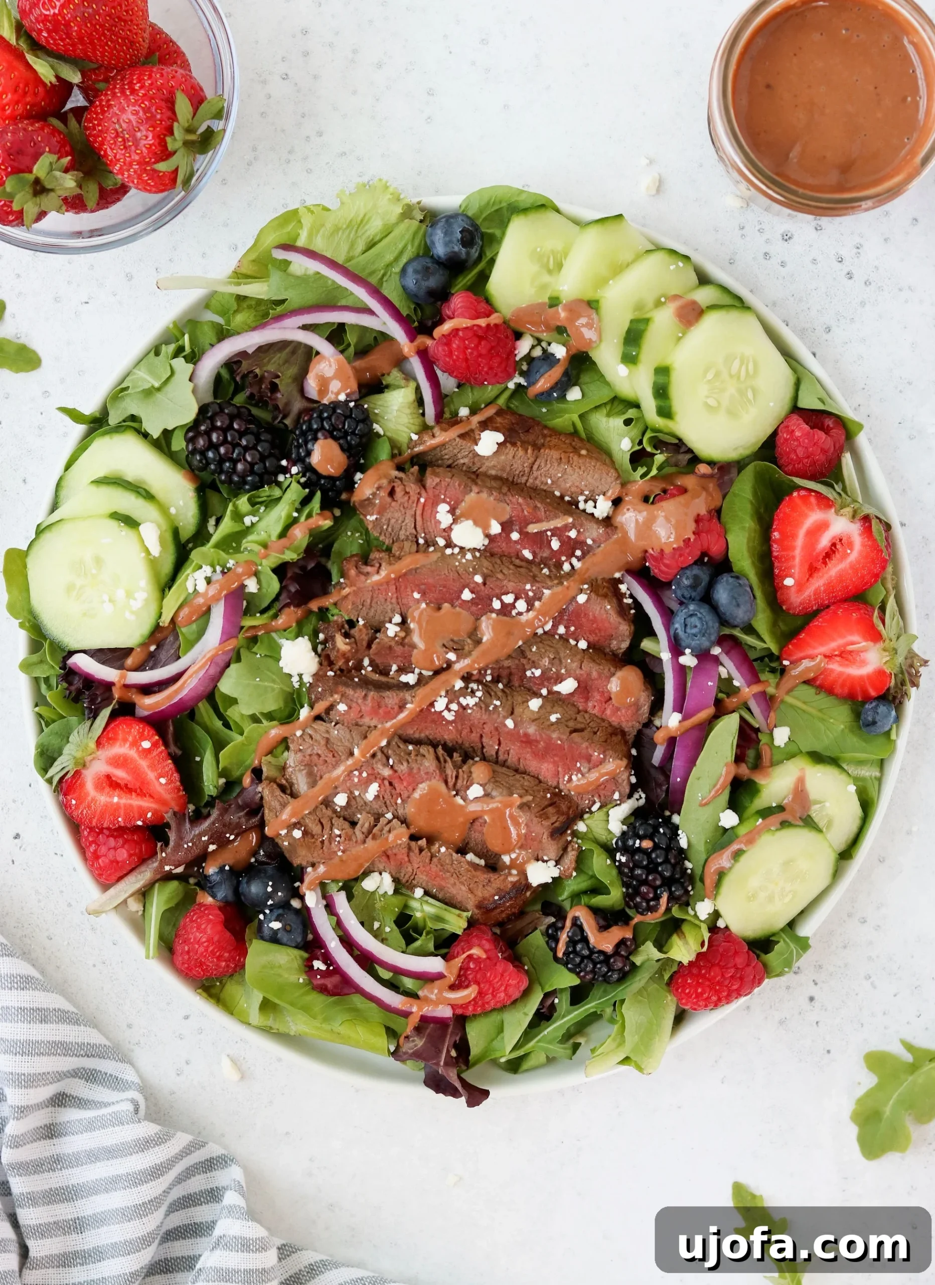 A close-up image showing the marinating steak in balsamic vinaigrette before cooking.