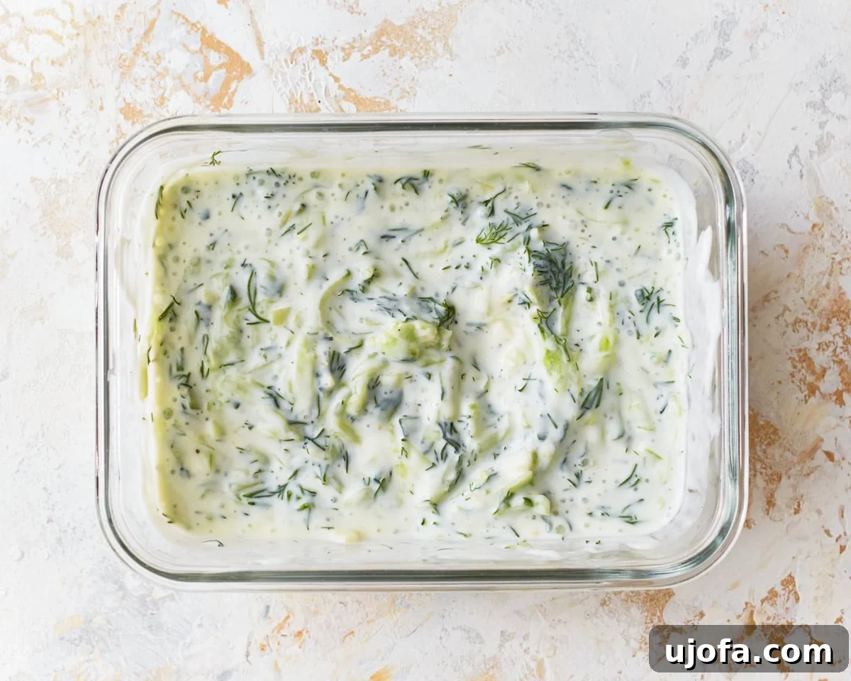 Dairy-free tzatziki in a glass dish