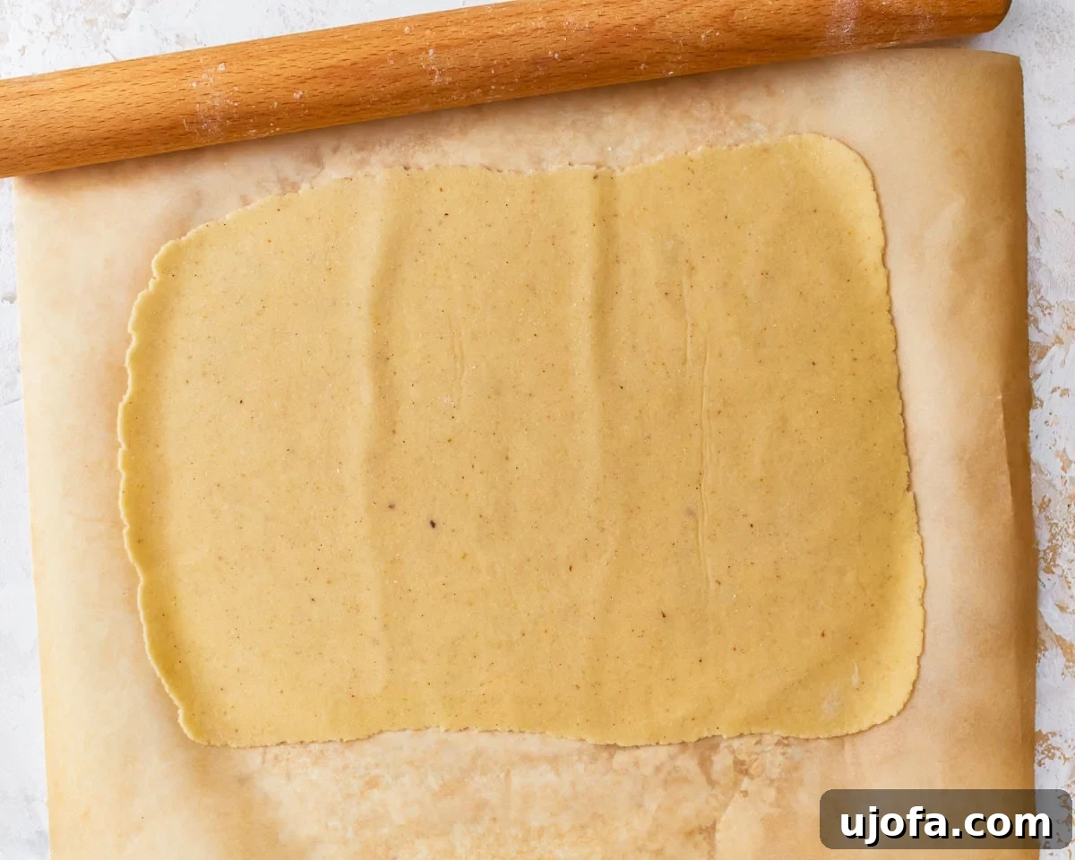 Almond flour pasta dough rolled out into a rectangle shape