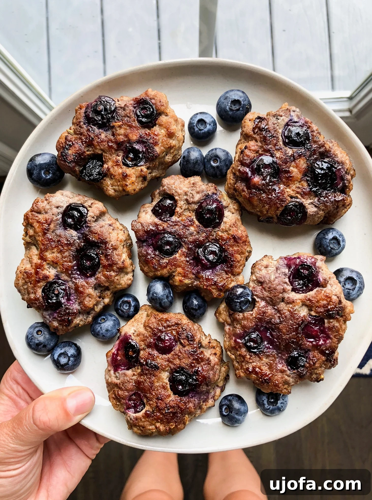 Close-up of a blueberry breakfast sausage patty with visible blueberries