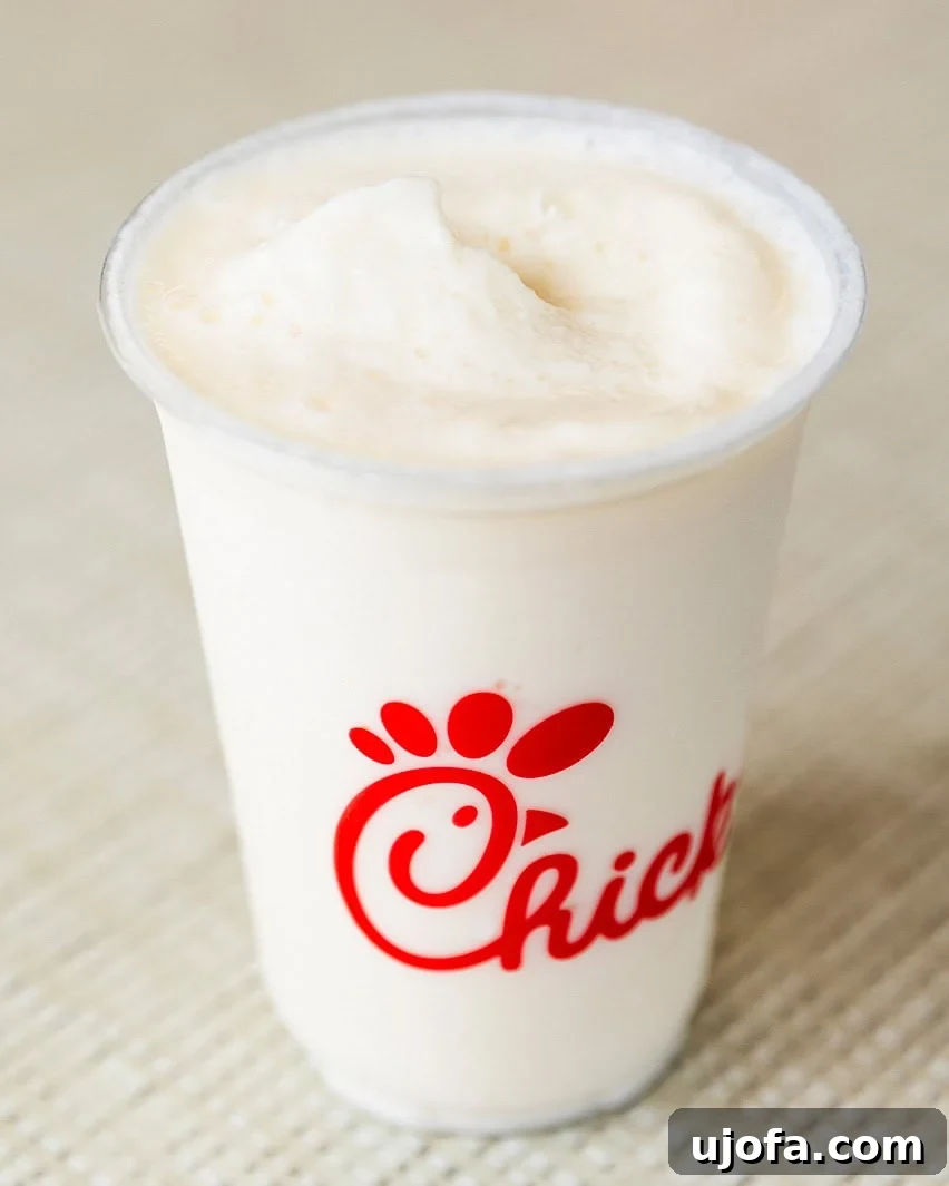 A refreshing Frosted Lemonade from Chick-fil-A, a perfect gluten-friendly beverage choice.