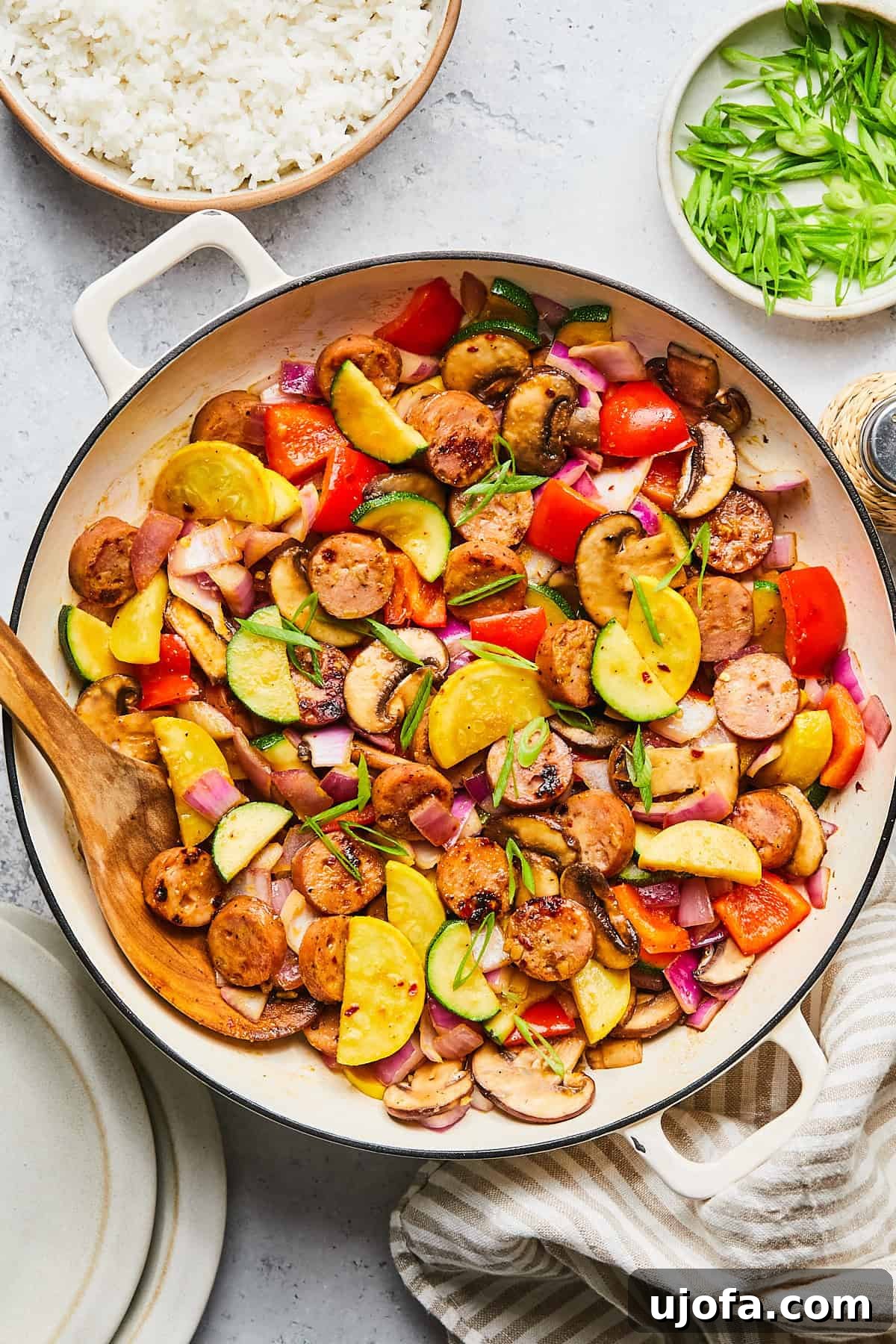 Apple Sausage Chicken Skillet Sensation 2 Sweet chicken apple sausage stir fry with colorful vegetables in a skillet