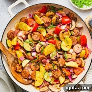 Apple Sausage Chicken Skillet Sensation 13 Sweet chicken apple sausage stir fry with colorful vegetables in a skillet