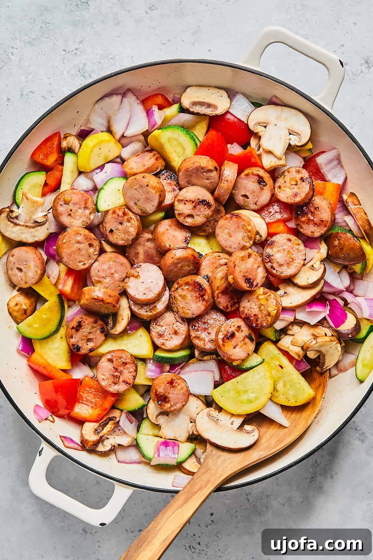 Apple Sausage Chicken Skillet Sensation 8 Adding cooked sausage back into stir fry pan