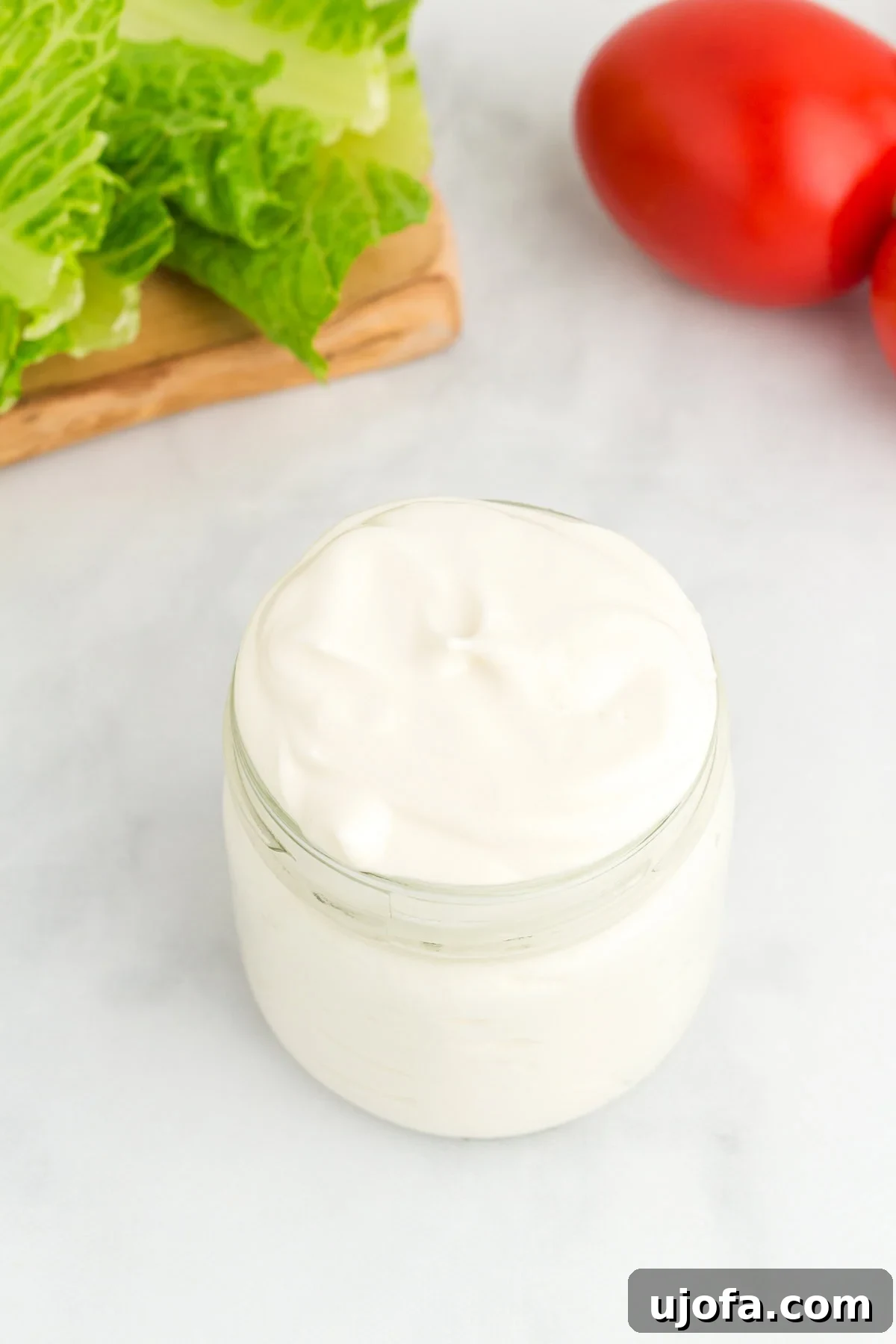 Velvet Vegan Mayo 2 A glass jar of homemade vegan mayonnaise
