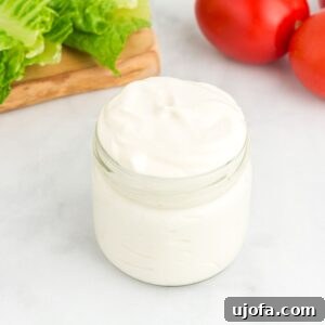 Homemade vegan mayonnaise in a jar, ready for use
