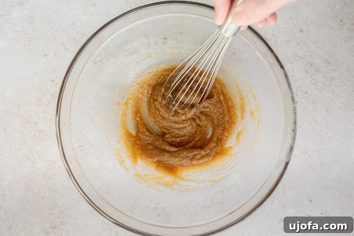 Chewy Coconut Flour Chocolate Chip Cookies 8 Brown sugar and butter whisked together in a glass mixing bowl