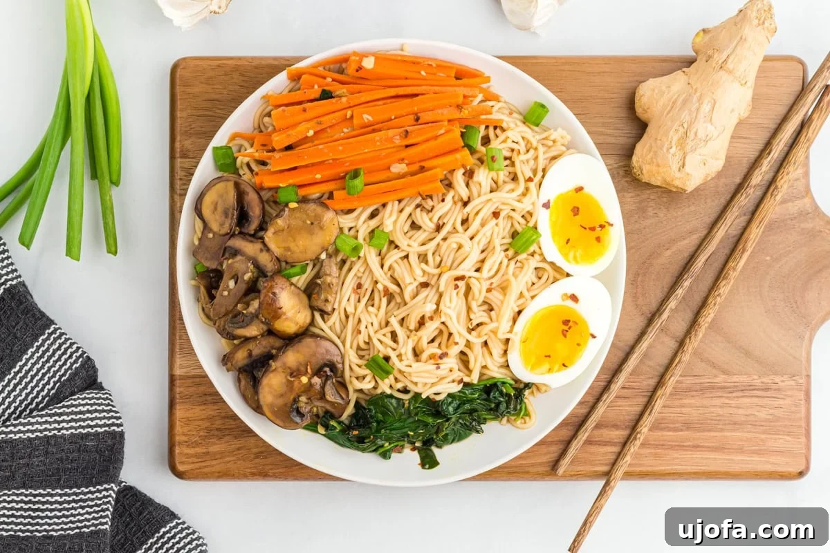 A large bowl of gluten-free ramen sits on a wooden chopping board, ready to be enjoyed.