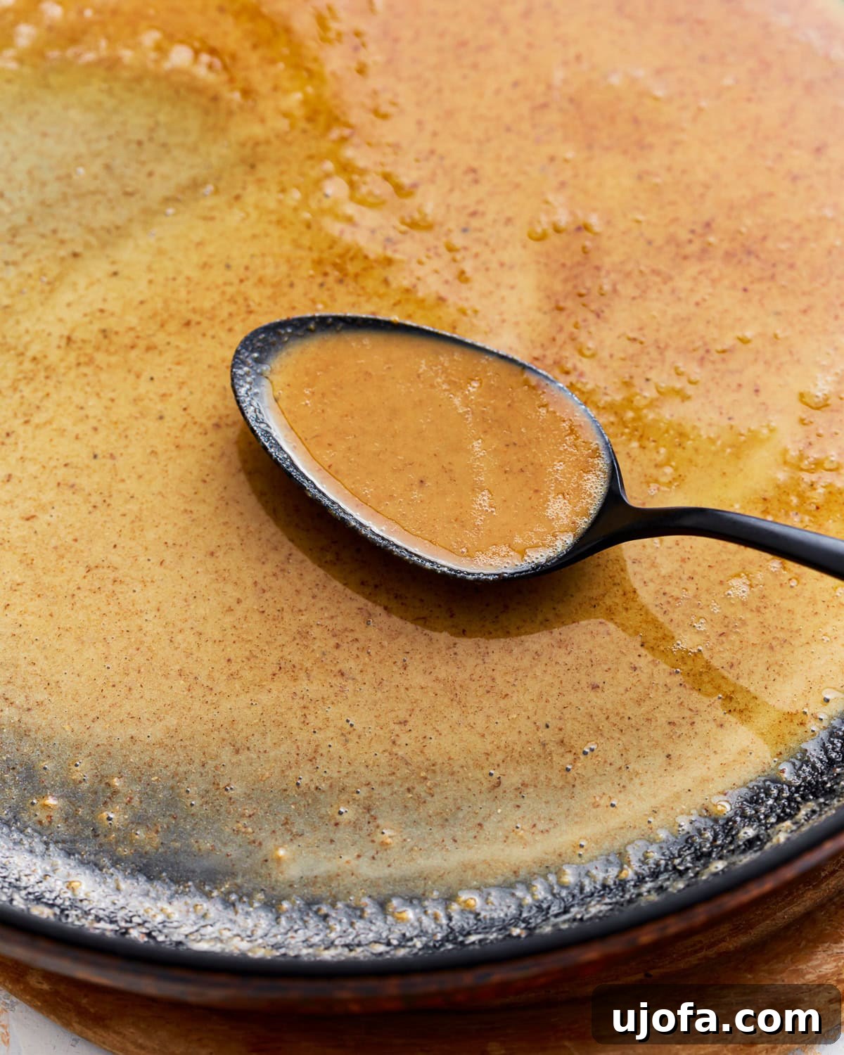 Mastering Gluten-Free Roux 2 Gluten-free roux in a skillet with a spoon.