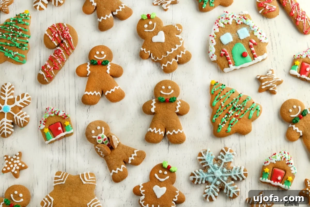 White Chocolate Gingerbread Cookies: Gluten-Free & Dairy-Free Friendly 3 A vibrant close-up of Gluten-Free Gingerbread Cut-Out Cookies, undecorated, showcasing their perfect texture and rich color against a white background.