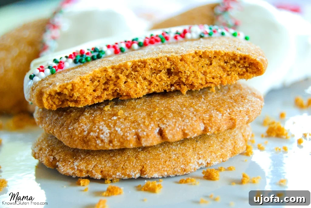 White Chocolate Gingerbread Cookies: Gluten-Free & Dairy-Free Friendly 4 Three Gluten-Free White Chocolate-Dipped Gingerbread Cookies, stacked artfully, highlighting their soft texture and the elegant white chocolate coating, ready for festive enjoyment.