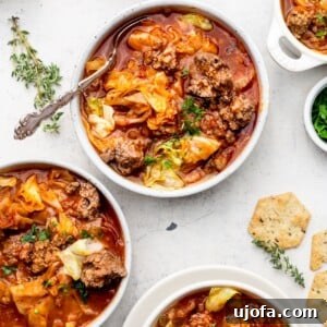 3 bowls of unstuffed cabbage soup with crackers