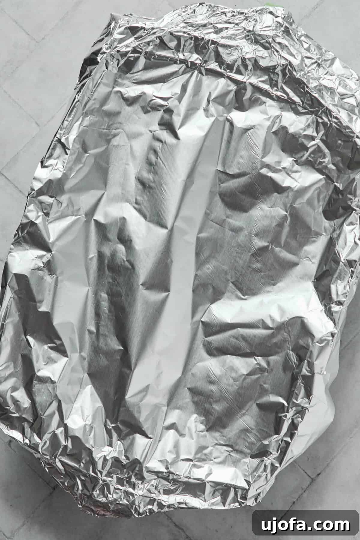 Kremamsı Boursin Orzo Tavuk Sosisli Tek Tencere Keyfi 6 Baking dish covered tightly with aluminum foil before being placed in the oven.