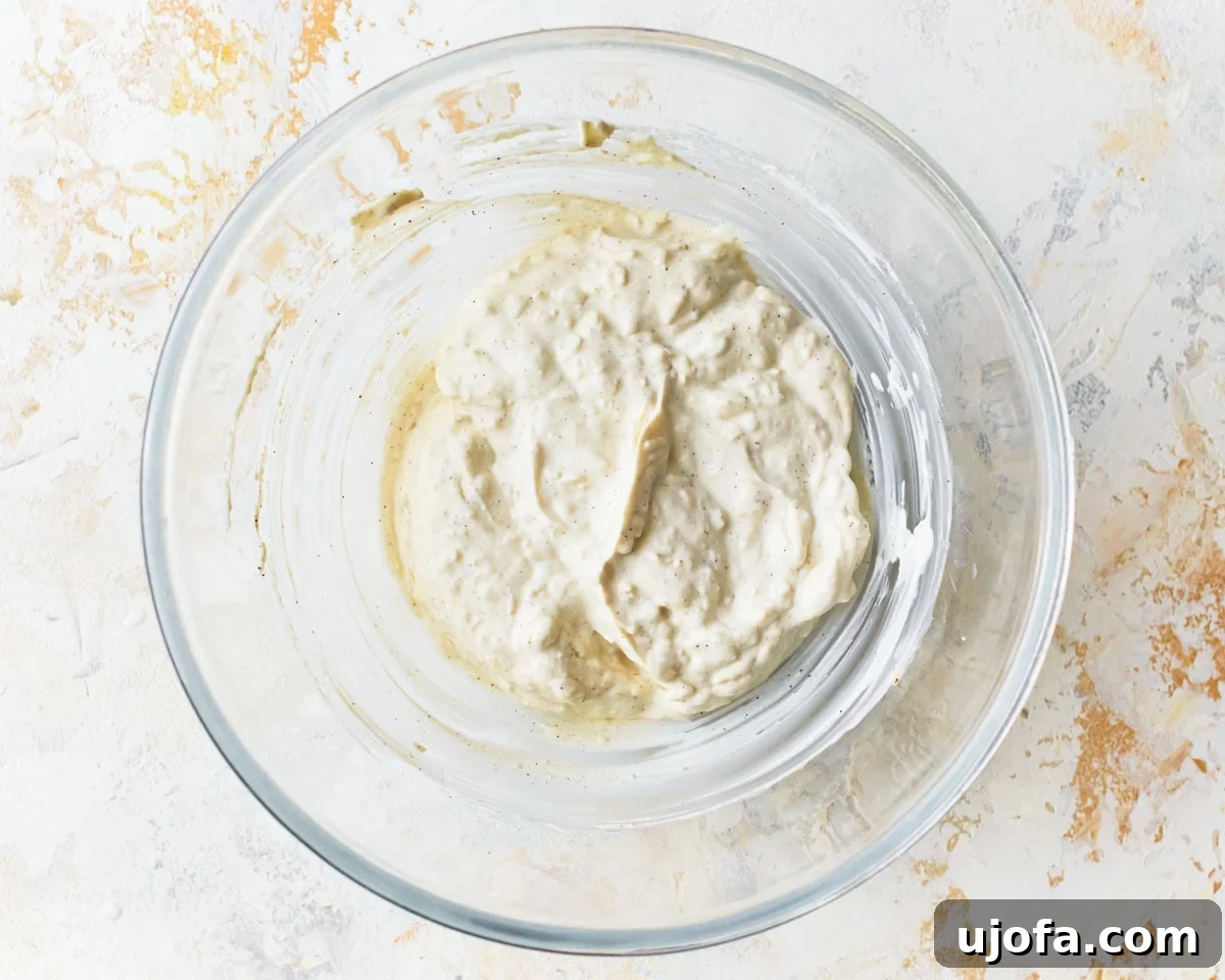 Gluten-free ravioli filling in a glass mixing bowl.