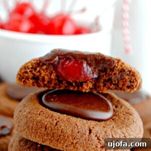 Gluten-free Chocolate Cherry Thumbprint Cookies, showcasing their rich chocolate base and vibrant cherry filling, ready to be enjoyed as a special holiday treat.