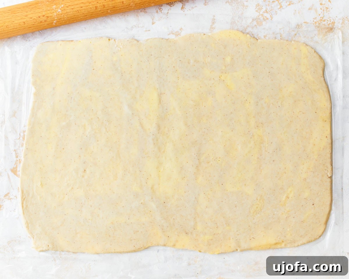The finished gluten-free puff pastry dough, rolled out into its final large rectangle shape, ready for wrapping and chilling.