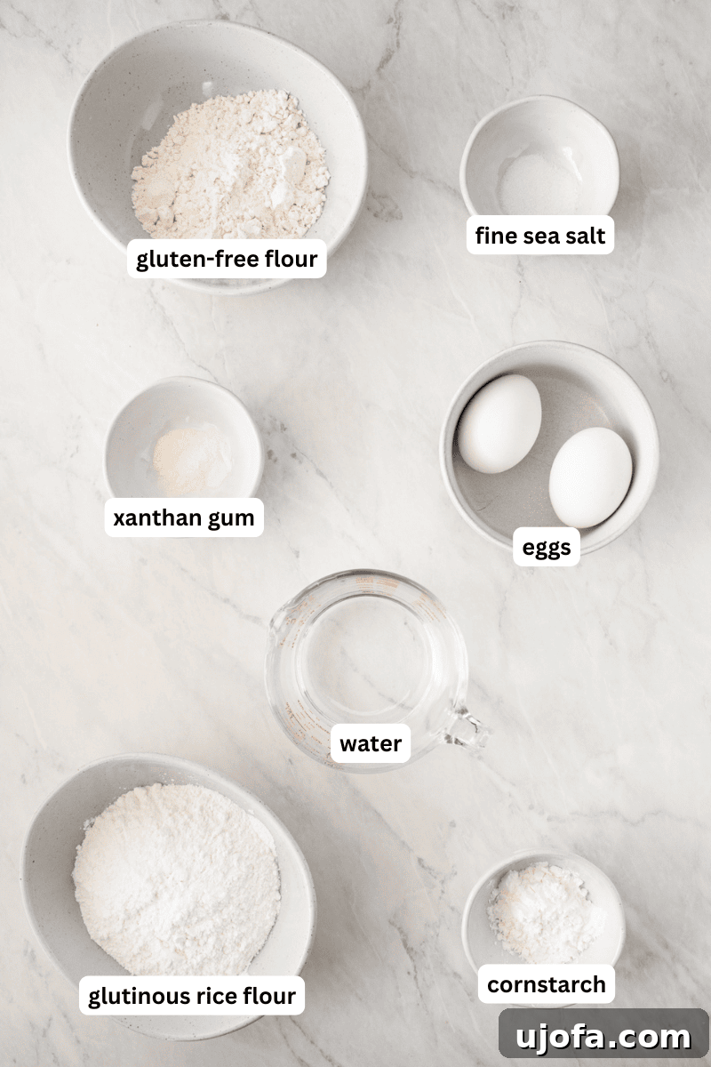 Crafting Gluten-Free Wonton Delights 3 A collection of gluten-free ingredients, including various flours, eggs, and oil, laid out on a wooden surface.