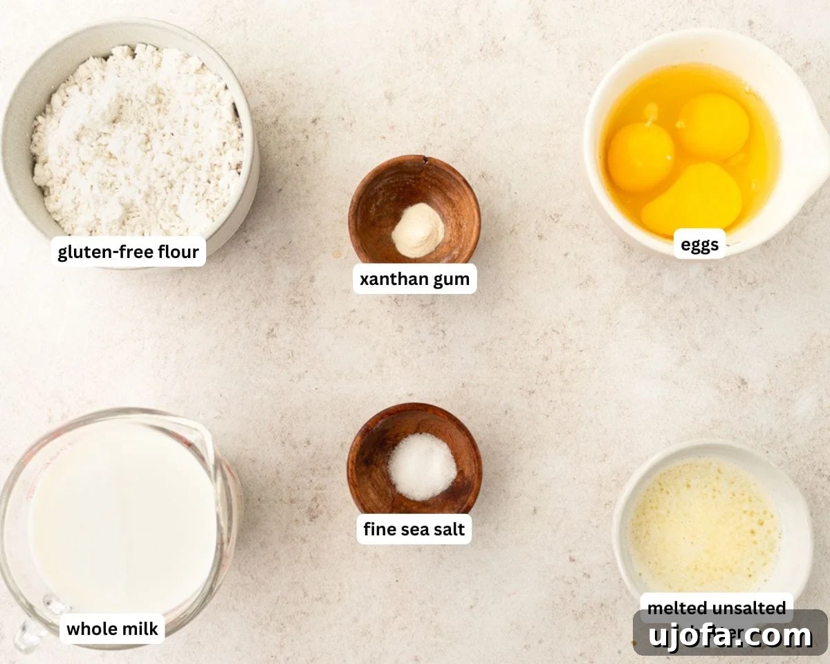 All the essential ingredients for making delicious gluten-free popovers laid out on a kitchen surface.
