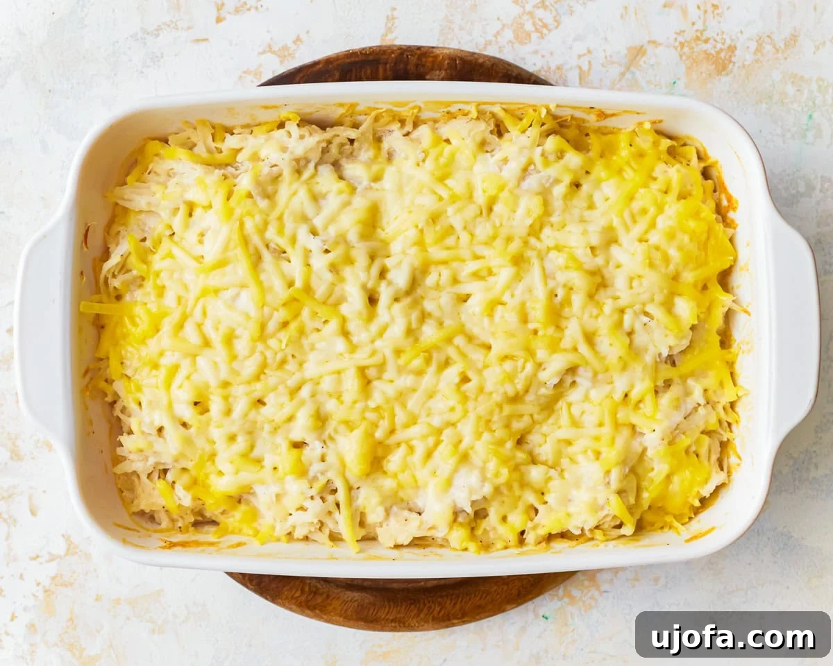 Yalancı Peynirli Patates 10 Dairy-free cheesy potatoes part way through cooking.