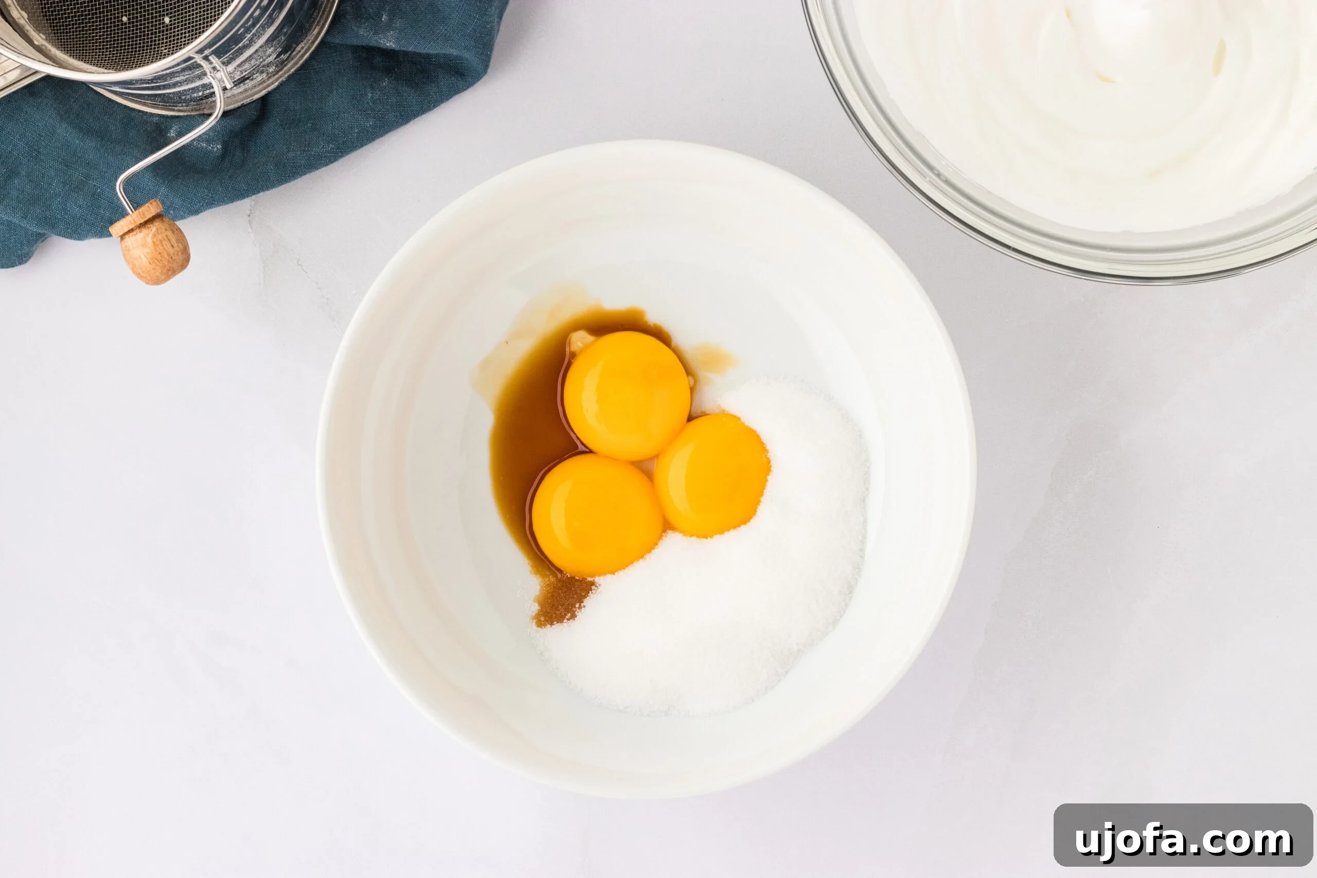 The Ultimate Gluten-Free Ladyfingers 12 3 egg yolks, vanilla, and white sugar in white bowl