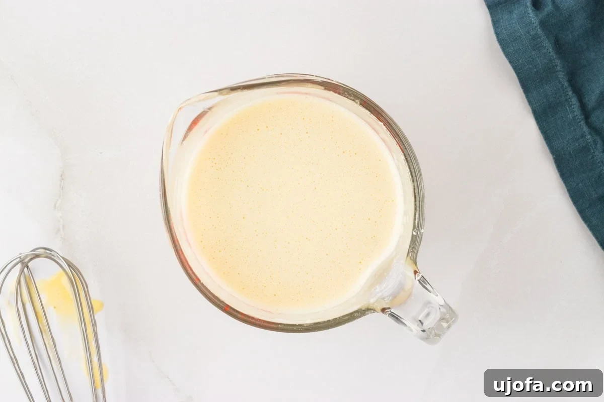 Perfect Gluten-Free Yorkshire Puddings 11 yorkshire pudding batter in glass mixing cup