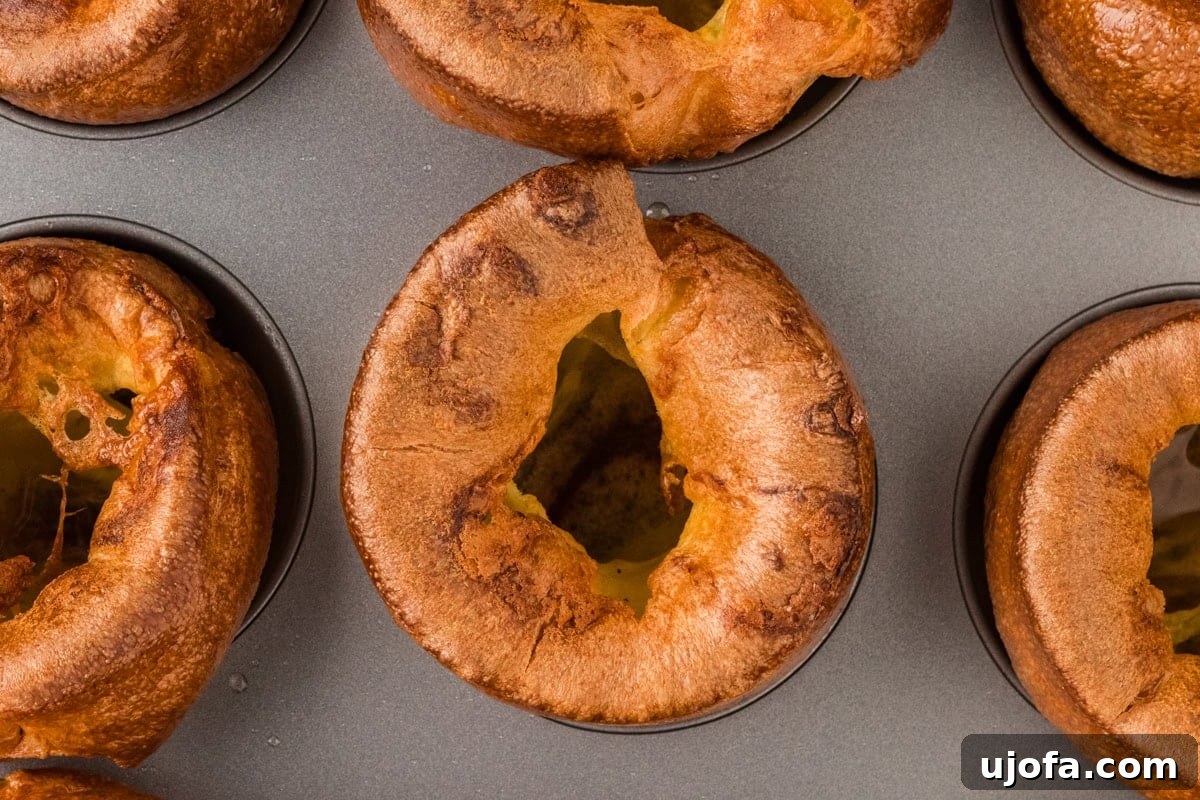 Perfect Gluten-Free Yorkshire Puddings 6 closeup of a few yorkshire pudding in baking tin