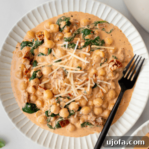 The Hummus Proposal 6 marry me chickpeas in white bowl with black fork resting on the side
