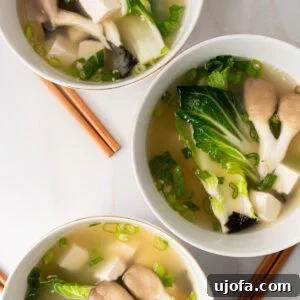 3 bowls of gluten free miso soup lined up vertically