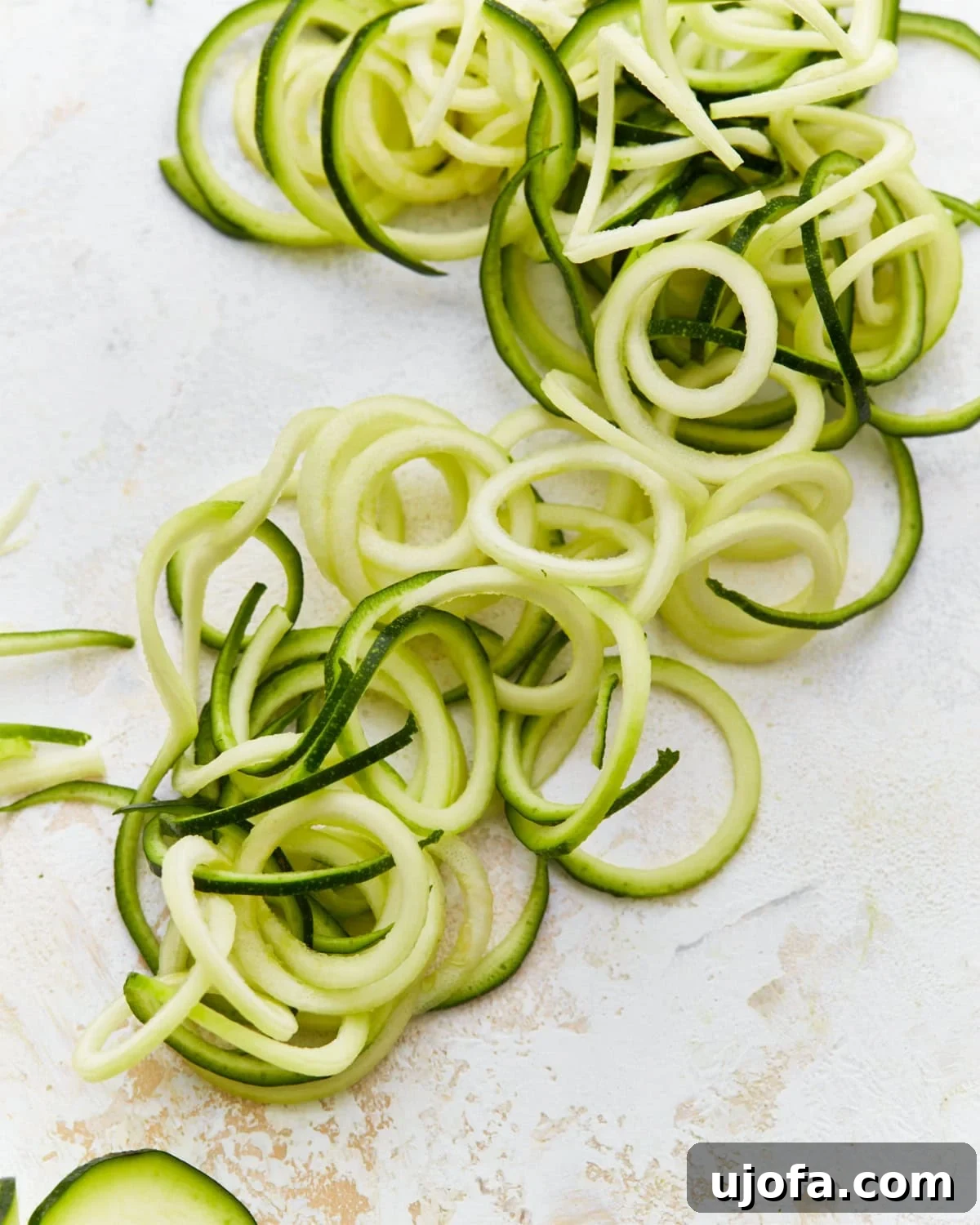 pile of spiraled zucchini noodles