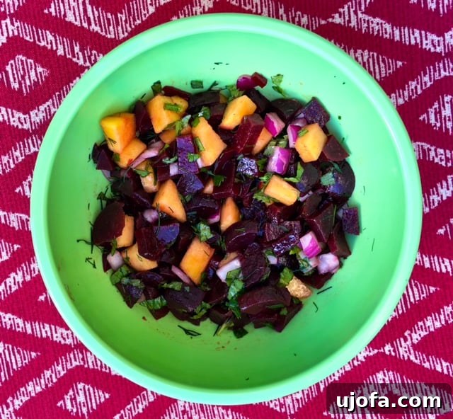 Vibrant Peach Beet Salad 2 Vibrant Peachy Beet Salad in a white bowl